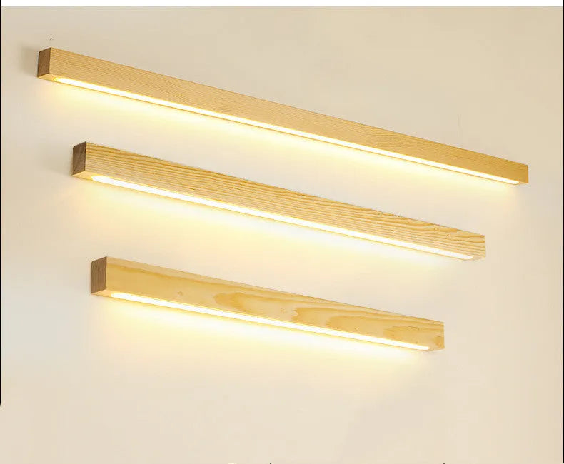 Walnut coloured Log Strip Wall Lamp linear LED light fixture in wood and acrylic