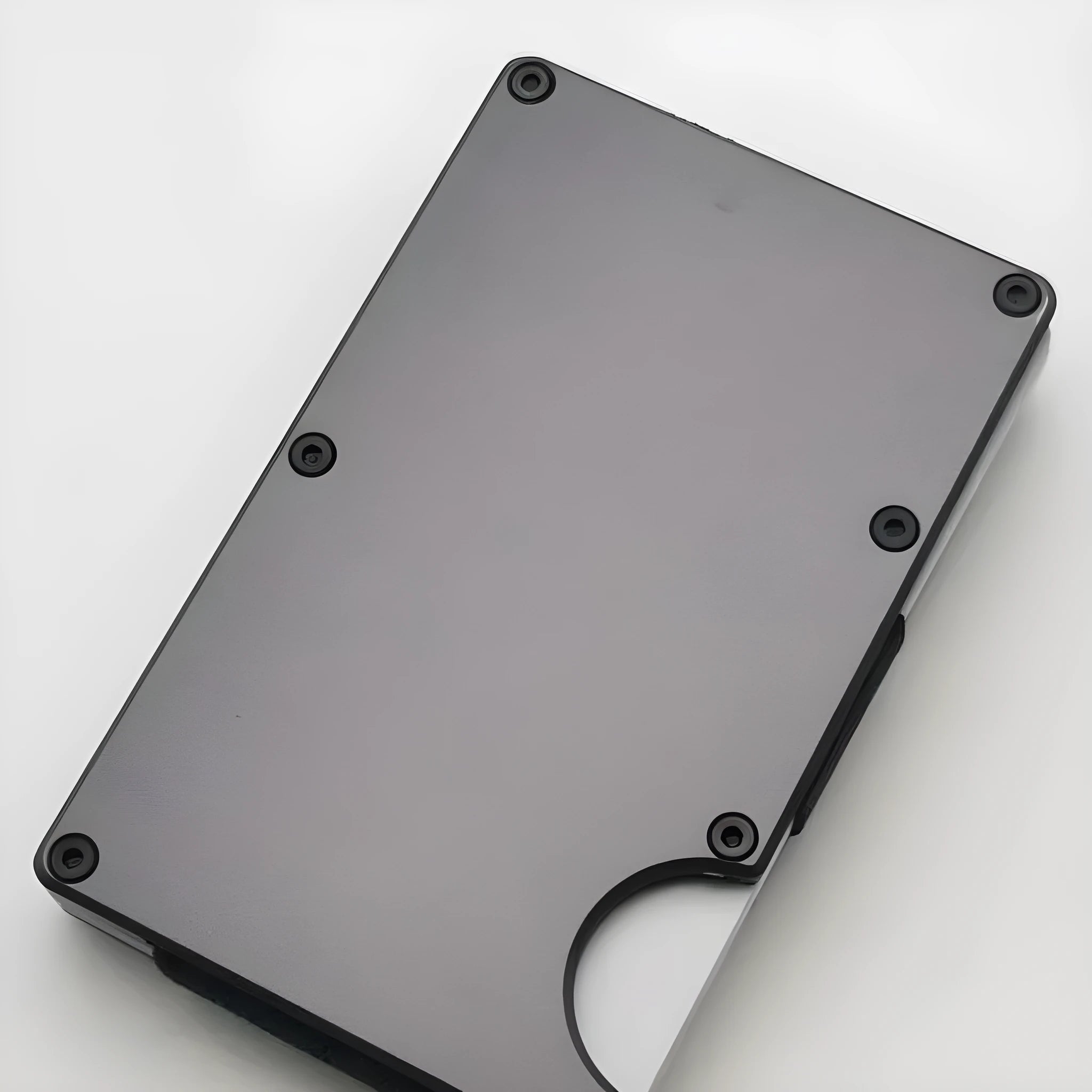 Slim aluminium grey carbon fibre credit card wallet with RFID-blocking security.