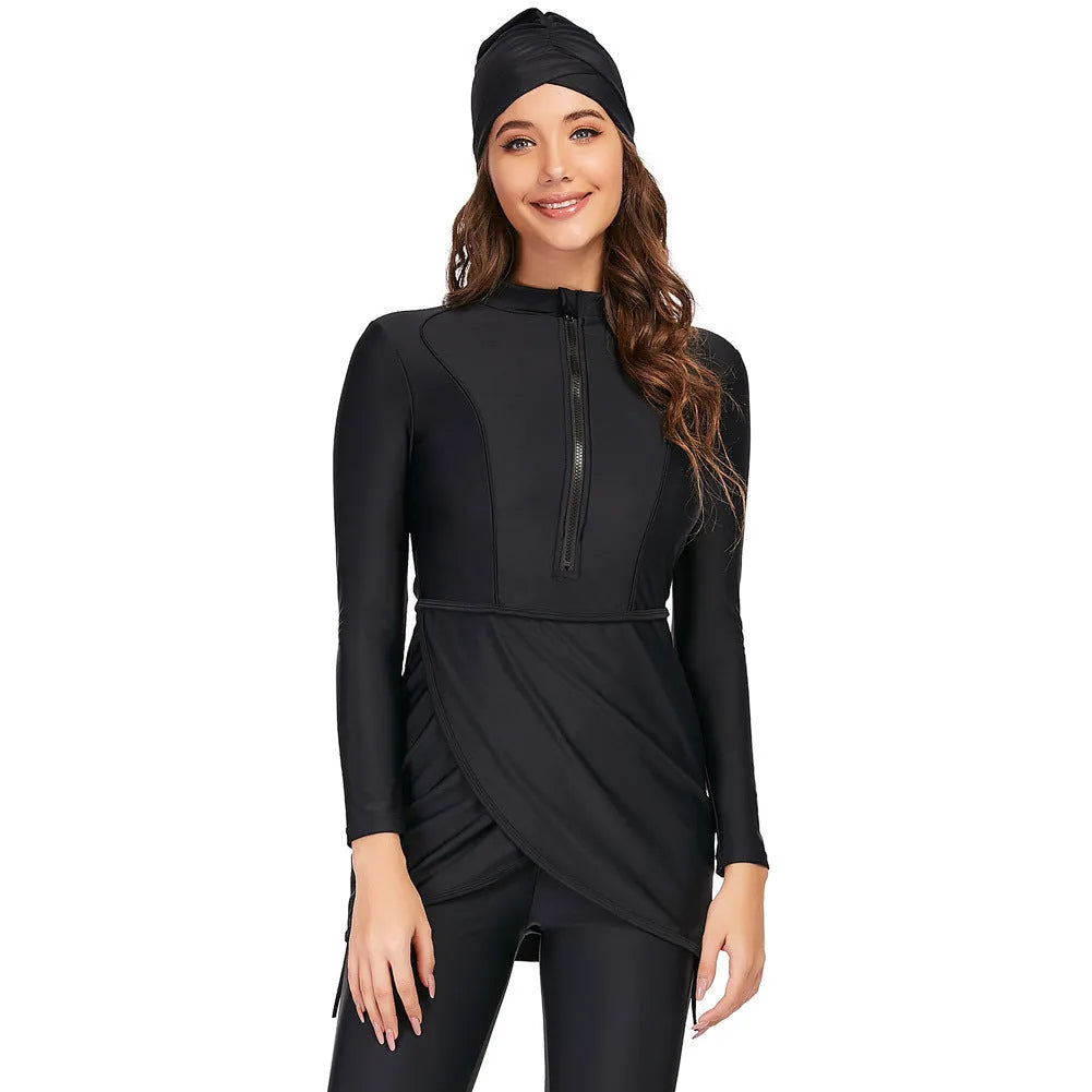 Black conservative Muslim ladies' two-piece swimsuit set on a mannequin, showing full-coverage top and pants design.