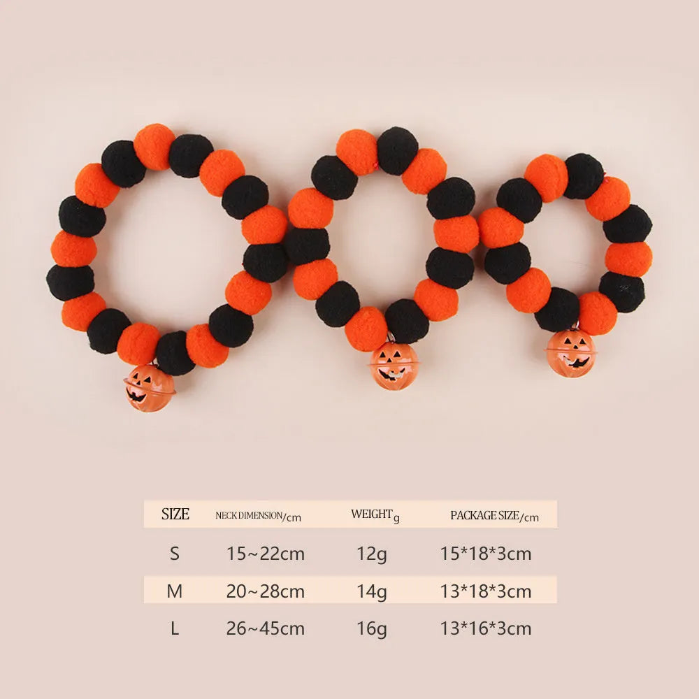 Black Halloween cat collar with pumpkin decoration on adjustable strap