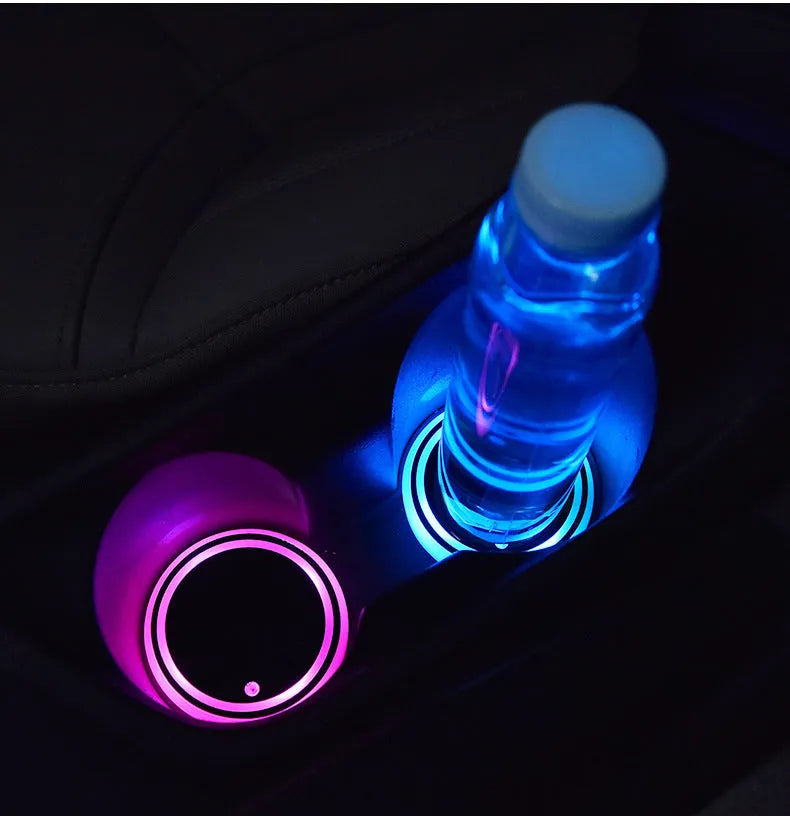Colourful LED light-up coaster for car cup holder with seven colour options and USB cable.