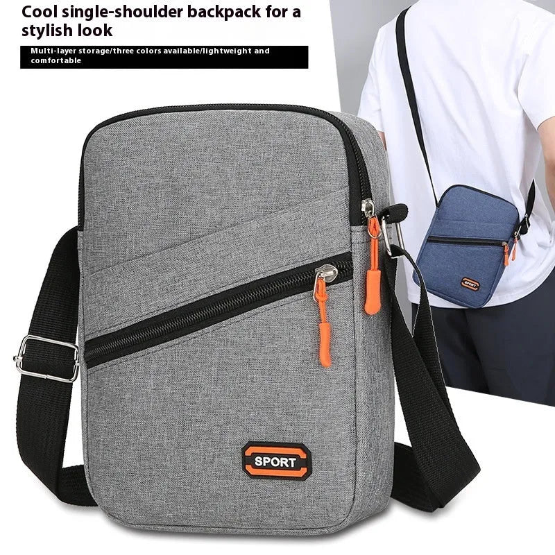 Ultra light Oxford cloth crossbody commuter bag in silver grey, black, or navy blue.