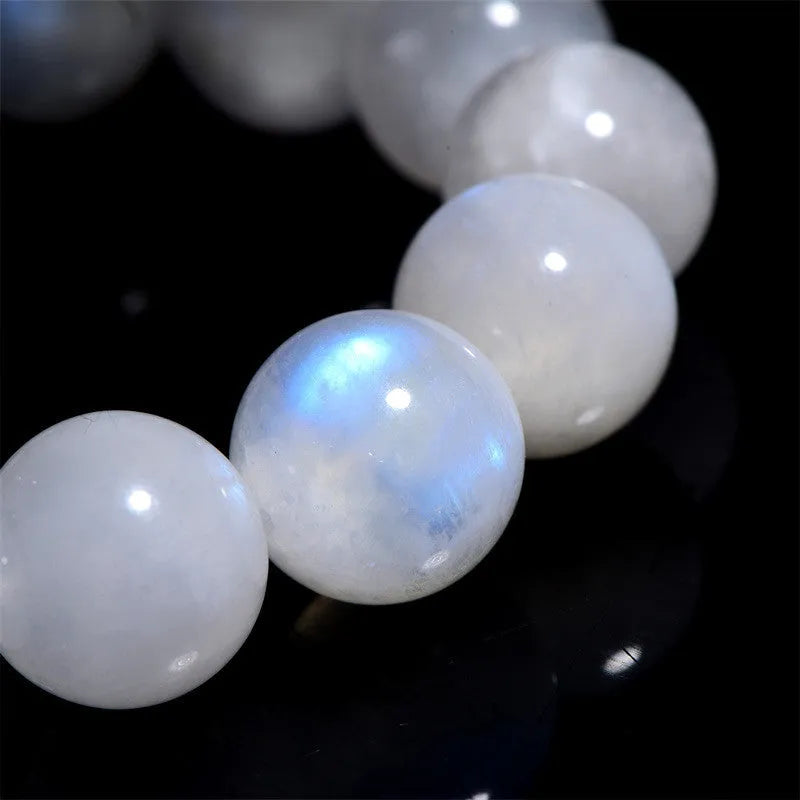 Natural blue moonstone bead bracelet with round geometry-shaped beads on wrist