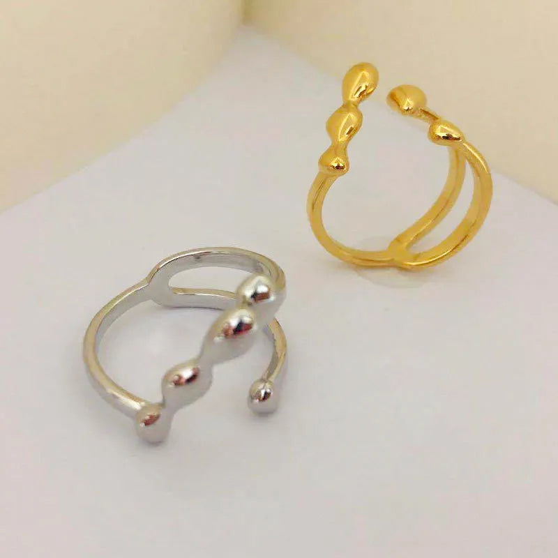 Brass adjustable circle ring with spherical design in gold finish