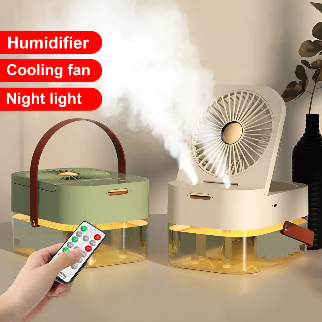 White desktop mist fan with humidifier tank and remote control on a wooden desk.
