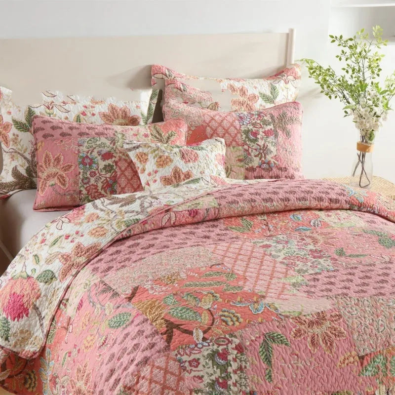 Handmade pure cotton bedding set in pink with flowers pattern on a 2.0m bed