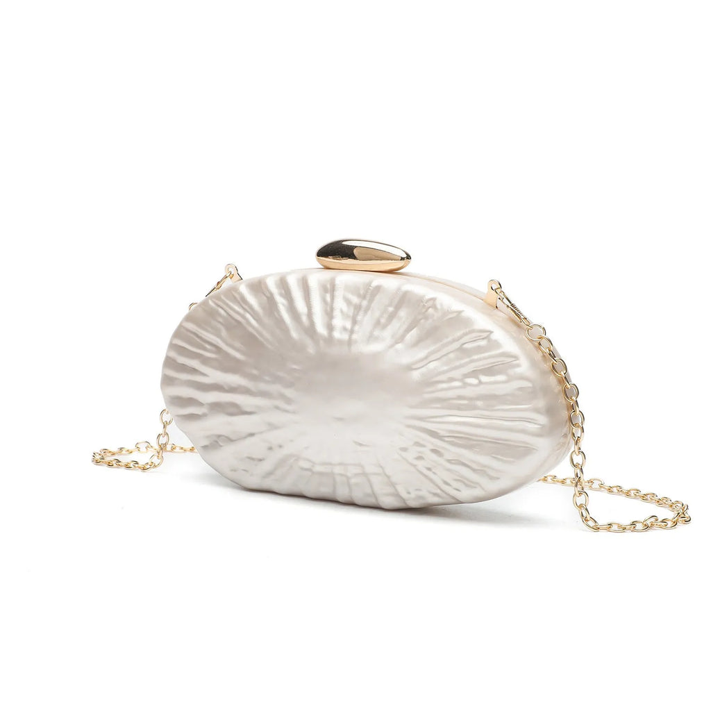Retro oval one-shoulder crossbody bag in shell colour with hard acrylic shell and slit pocket