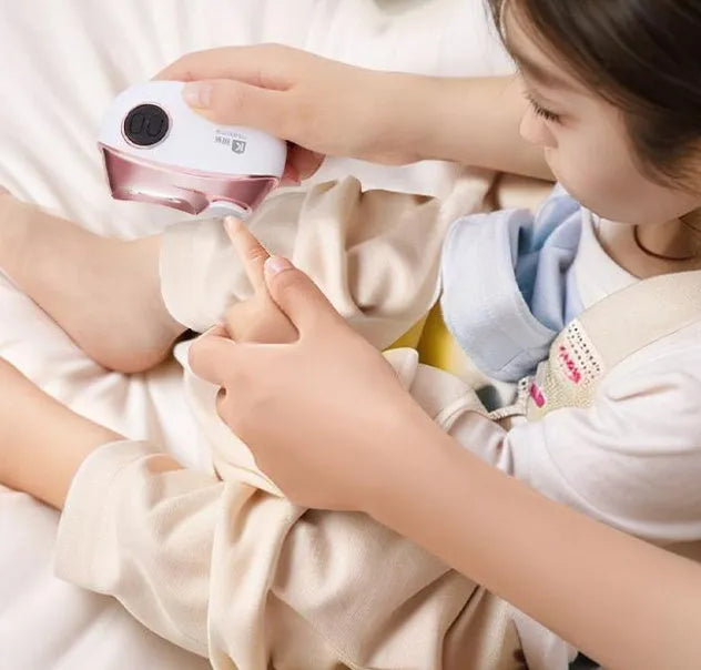 Blue electric nail clipper and polisher two-in-one tool with Type-C charging cable and cleaning brush.