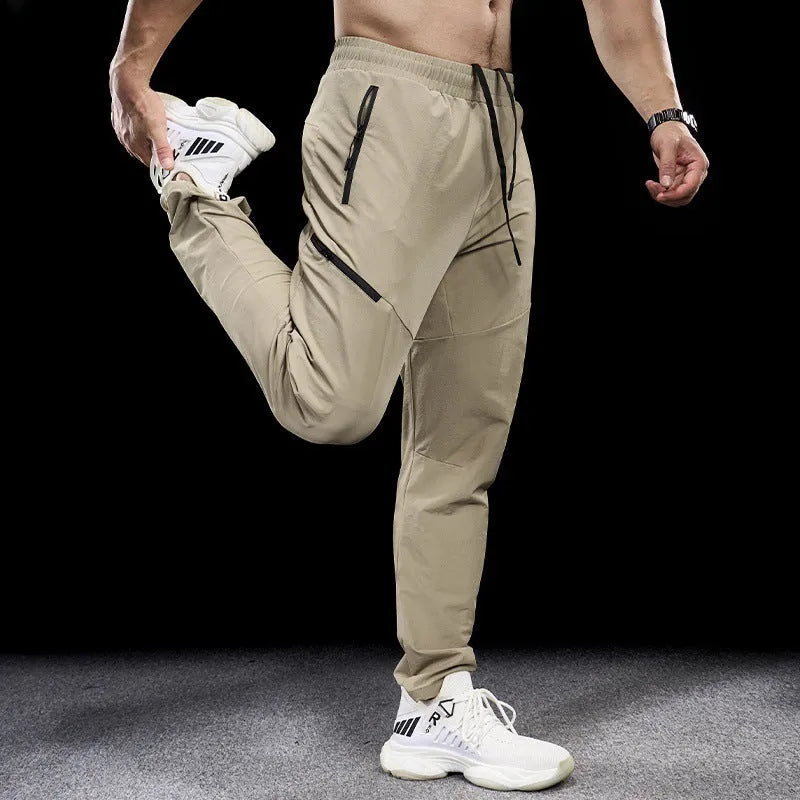 Men's waterproof quick-dry nylon workout pants in multiple colours with mid-waist trousers length design