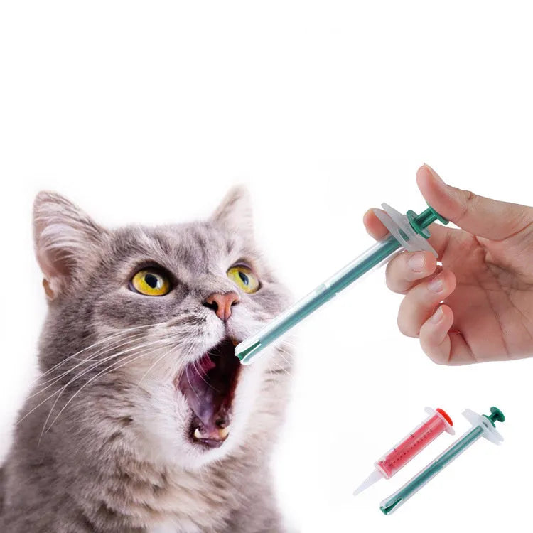 Two pet pill shooters with soft silicone tips in different sizes for cat and dog medication
