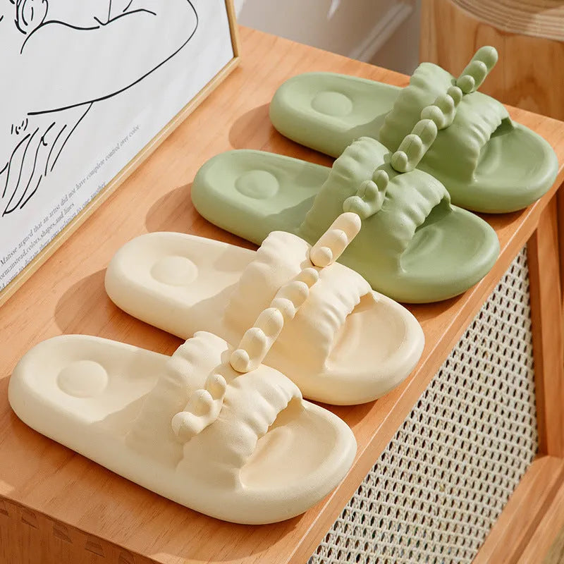 Women's EVA flip flop slippers with deer horn cut-out design in light yellow, showing non-slip sole.