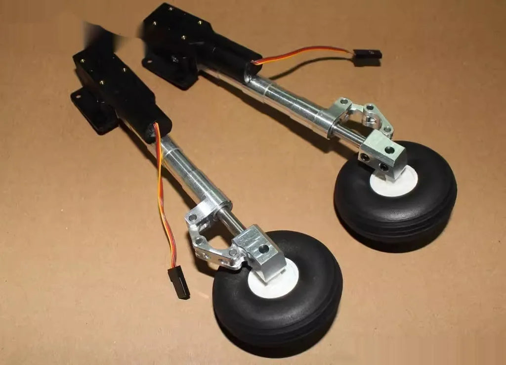 Alloy retractable shock-absorbing landing gear for RC aircraft with large wheels.