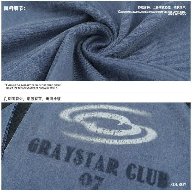 Men's blue hip hop T-shirt with white letter print and raglan sleeves on hanger