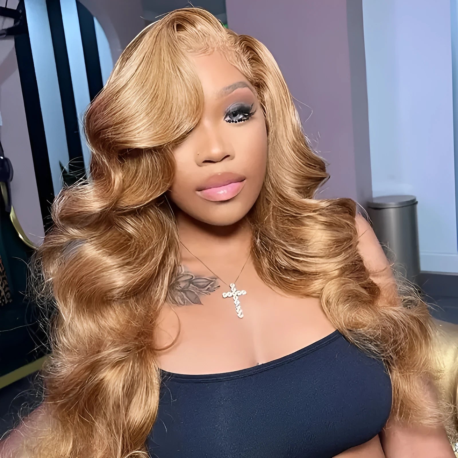 Light brown synthetic wig with golden waves and side bangs in exotic style