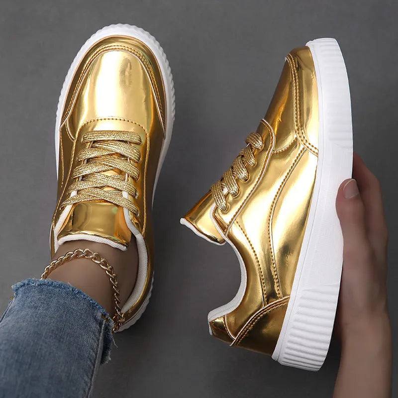 Rose gold sequin platform sneakers with round toe and thick sole.