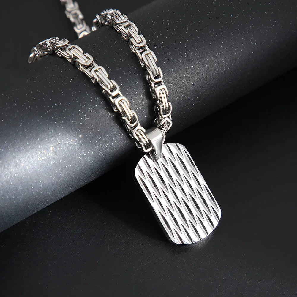 Men's titanium steel necklace with geometric water ripple pendant on an emperor chain.