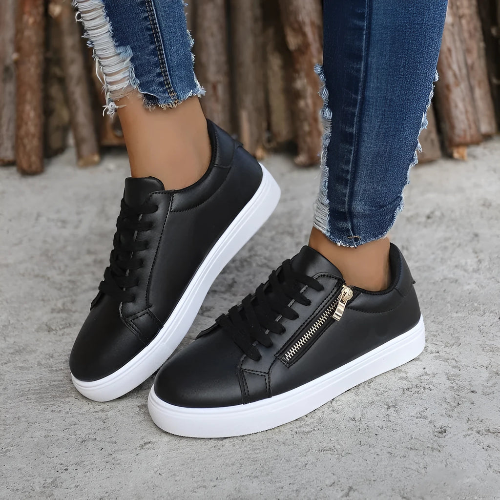 Women's casual sports shoes with side zipper, artificial PU upper, and rubber sole in black