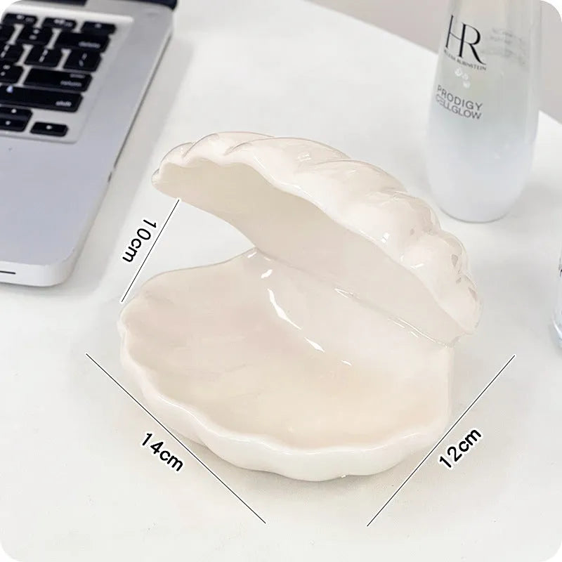 Yellow porcelain tray with a choice of pink or white decorative shell, some versions include a small integrated night light.