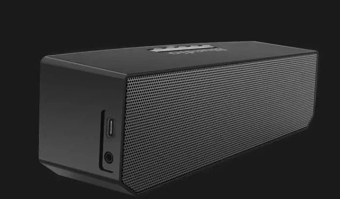 Black BS-6 cloud smart speaker showing front grill and control buttons.