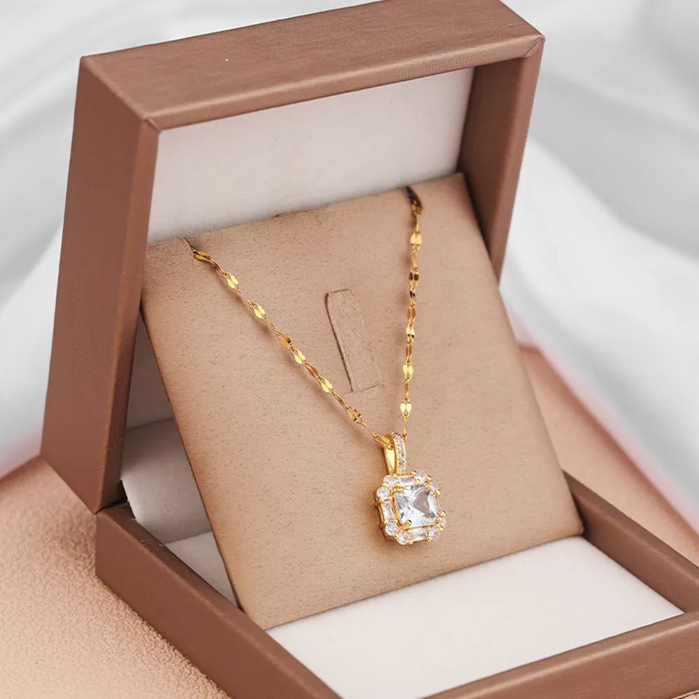 Gold titanium steel clavicle necklace with geometric zircon pendant on water wave chain