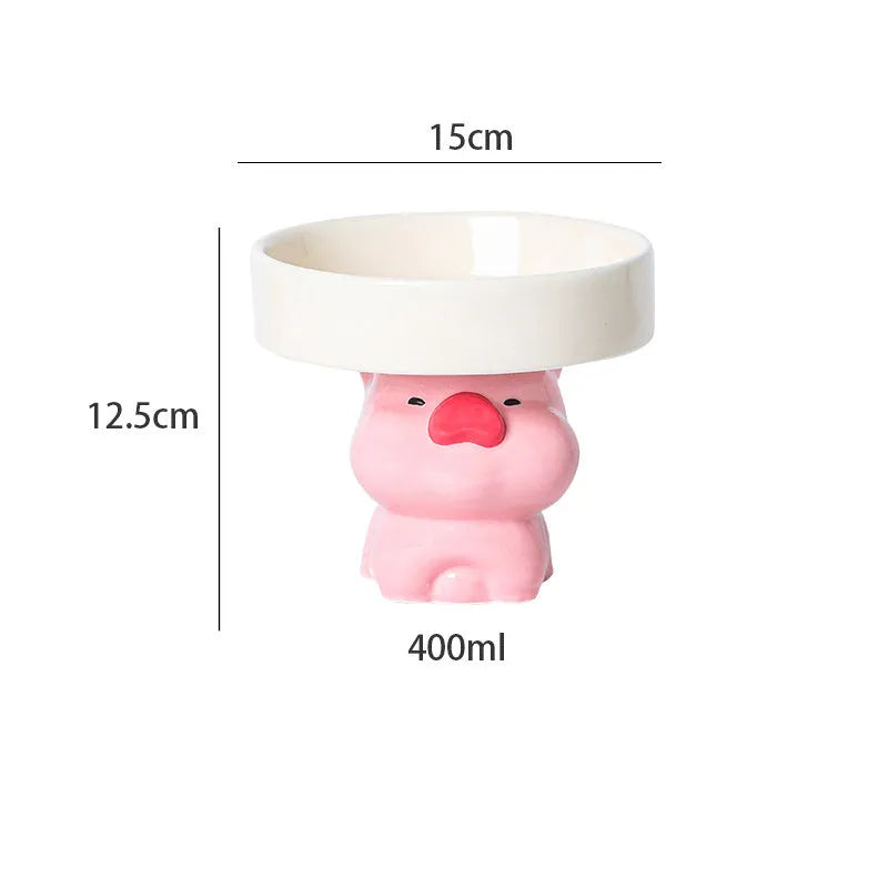 Raised ceramic pet bowl in animal design, showing wide opening for whisker comfort