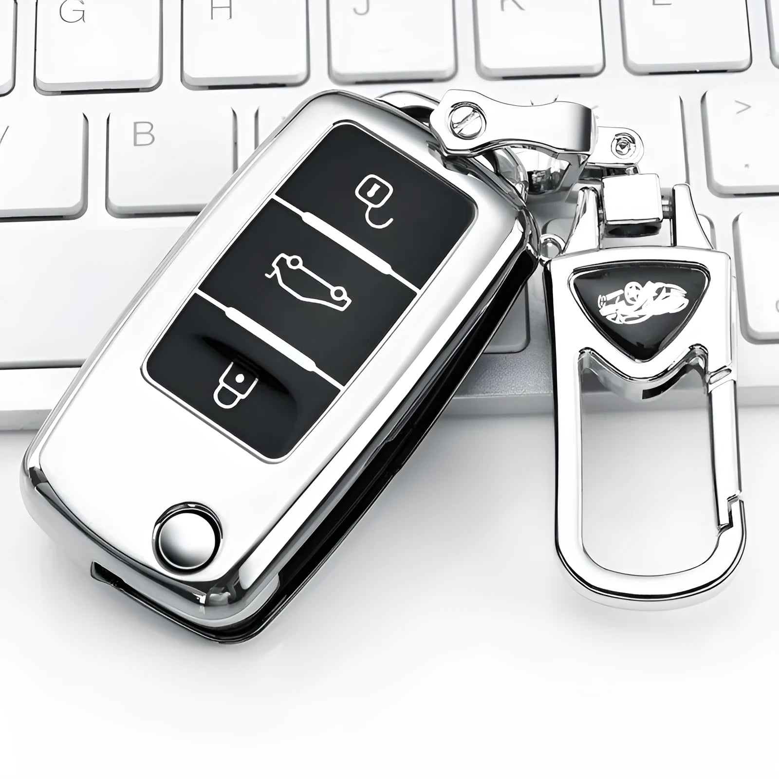 VW Model A car key case buckle set in silver, blue, pink, and red colours, showing TPU material and folding key design.