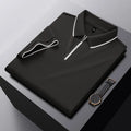 Men's solid colour short sleeve polo shirt in long-staple cotton showing regular fit and zipper detail