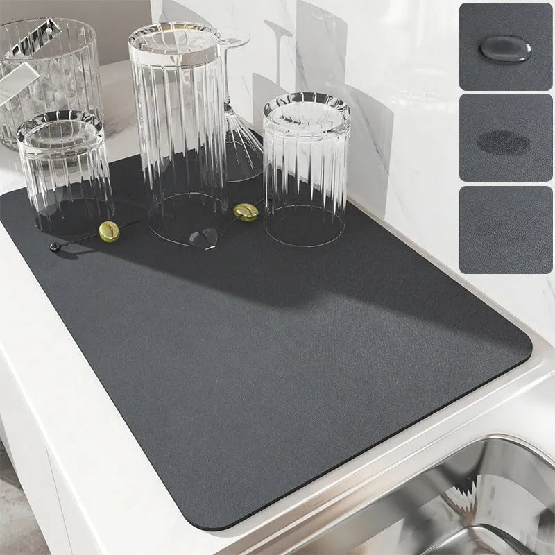 Black square super absorbent PU leather kitchen drain pad drying mat with anti-slip backing on a countertop.