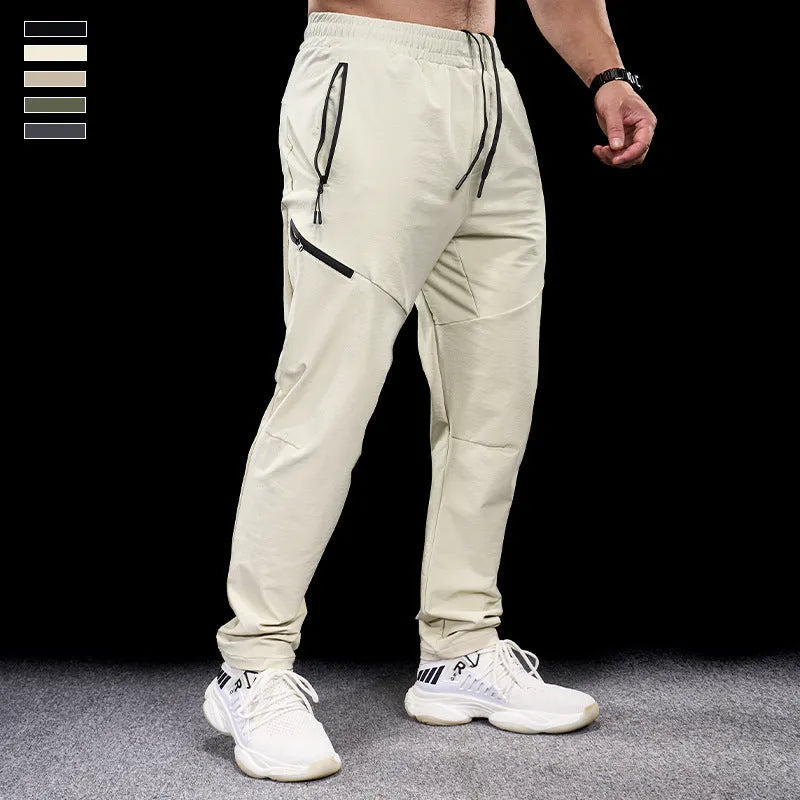 Men's waterproof quick-dry nylon workout pants in multiple colours with mid-waist trousers length design