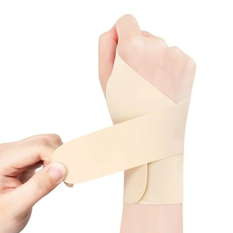 Adjustable black athletic wristguard for left or right hand during badminton or tennis.