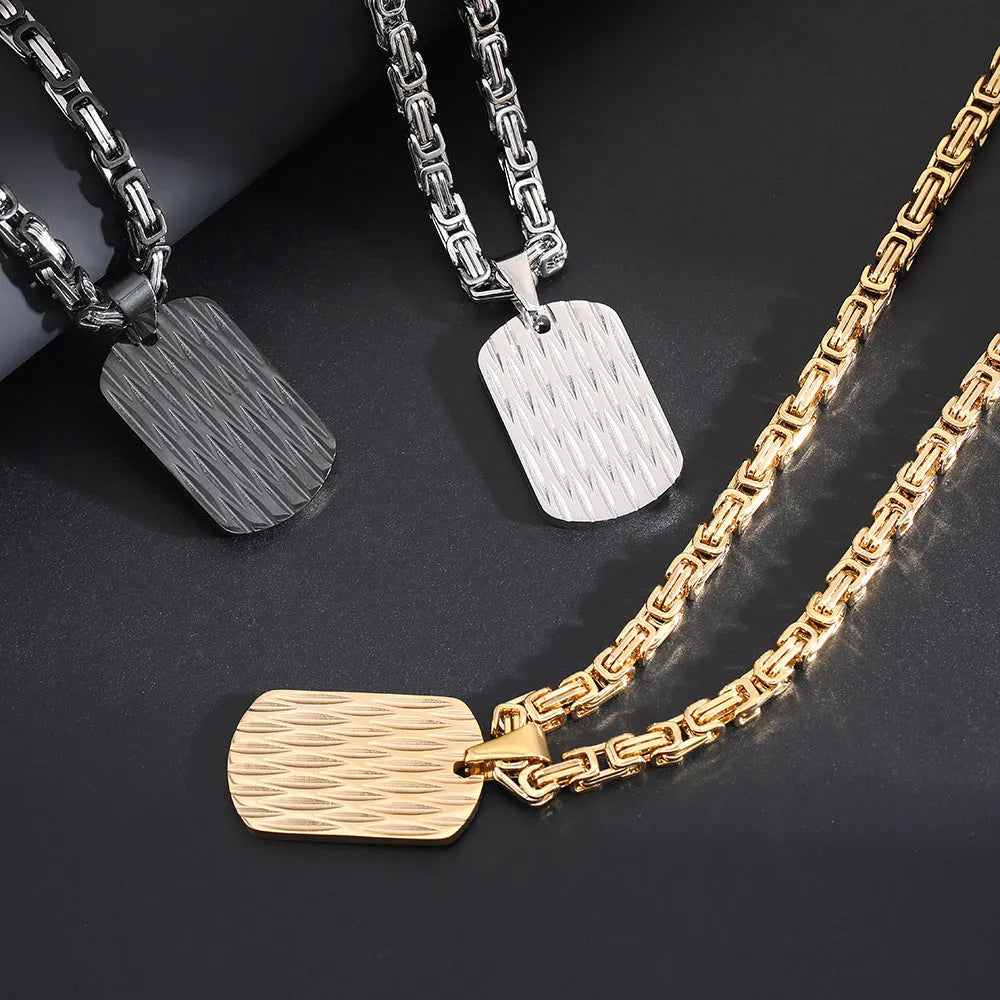 Men's titanium steel necklace with geometric water ripple pendant on an emperor chain.