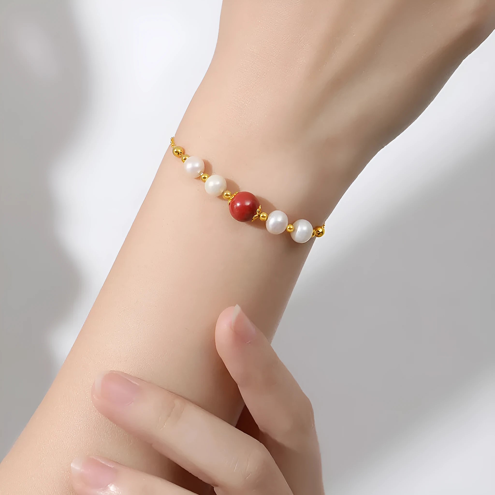 Yellow cinnabar charm on a silver 925 adjustable bracelet chain for women