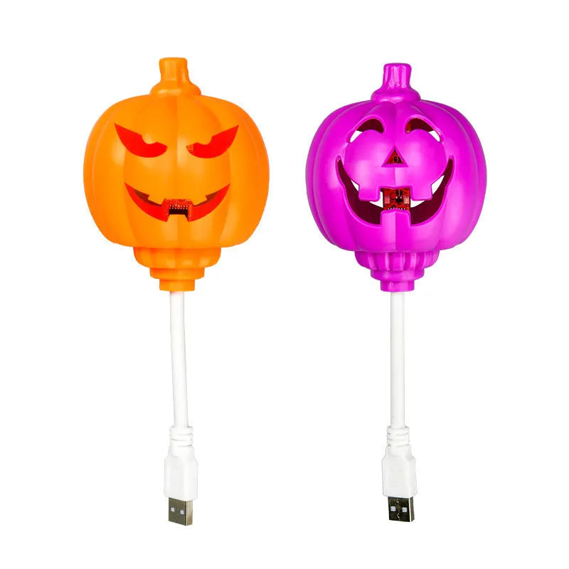 Pumpkin-shaped decorative lamp with USB cable for Halloween and autumn lighting in yellow or purple colours