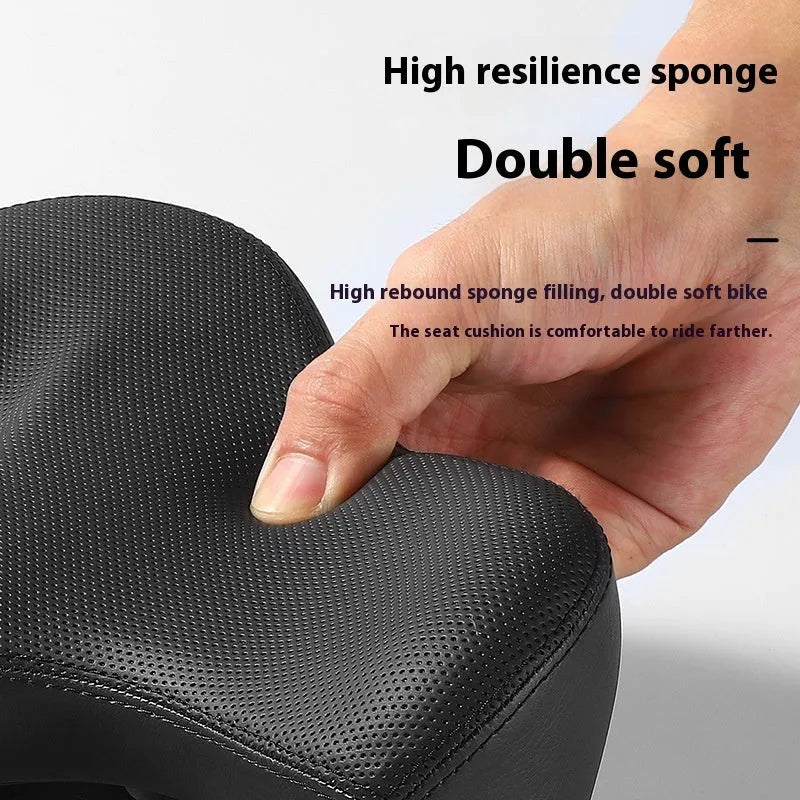 Black bicycle saddle cushion with thickened foam padding for shock absorption.