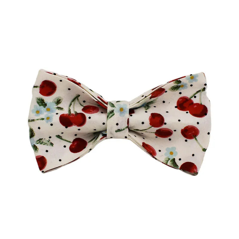 Red cherry printed dog collar with light gold buckle and matching leash set with bow accessory