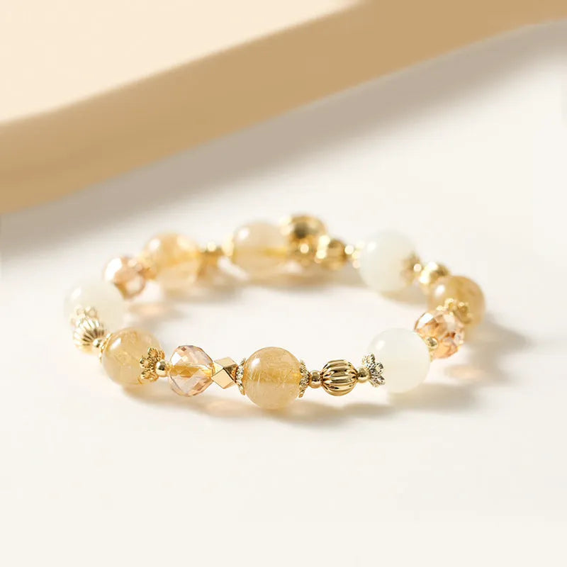 Gold electroplated rutilated quartz bracelet with faceted crystal beads in Lucky Fortune colour
