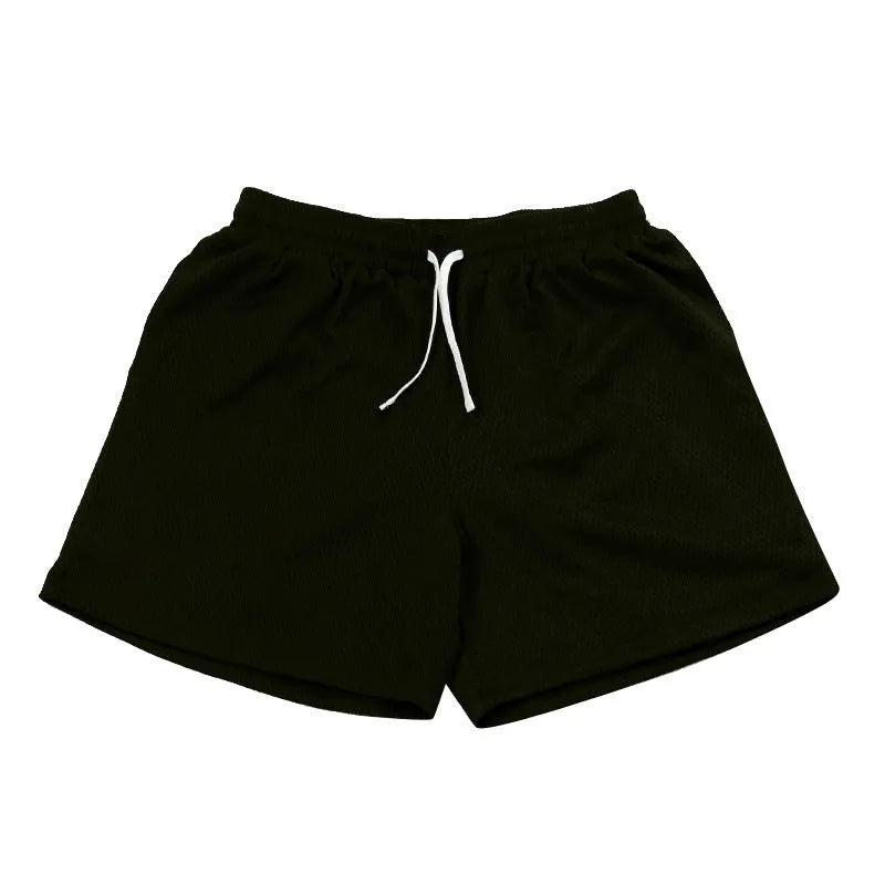 Men's mesh quick-drying shorts in black colour for summer running and fitness activities