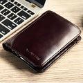 Men's black leather bifold wallet open to show card slots, coin pocket, and photo window.