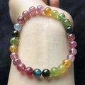 Women's tourmaline bracelet with four-leaf clover pearl pendant and geometric drop-shaped elements