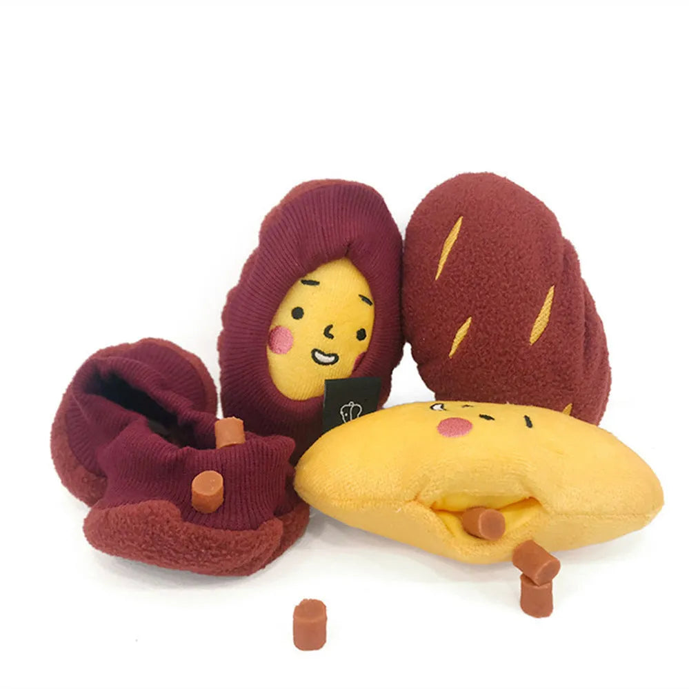 Red sweet potato dog puzzle toy with removable peel showing internal treat pockets