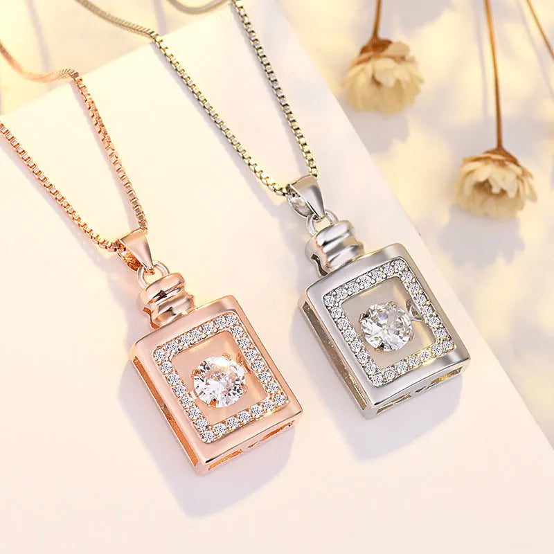 Silver or rose gold heart-shaped necklace with crown and bow charms for women