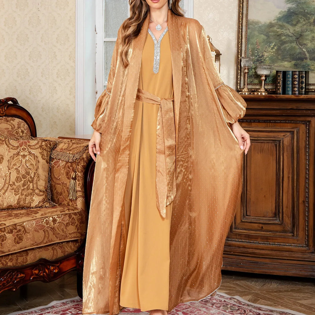 Brown Dubai Arabic two-piece dress set with rhinestone detail on long sleeve top and matching long skirt