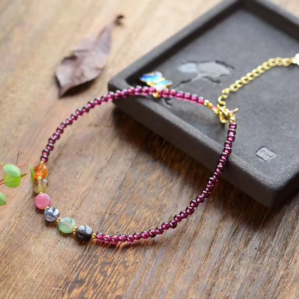 Purple garnet stone women's anklet with ethnic geometric design on ankle