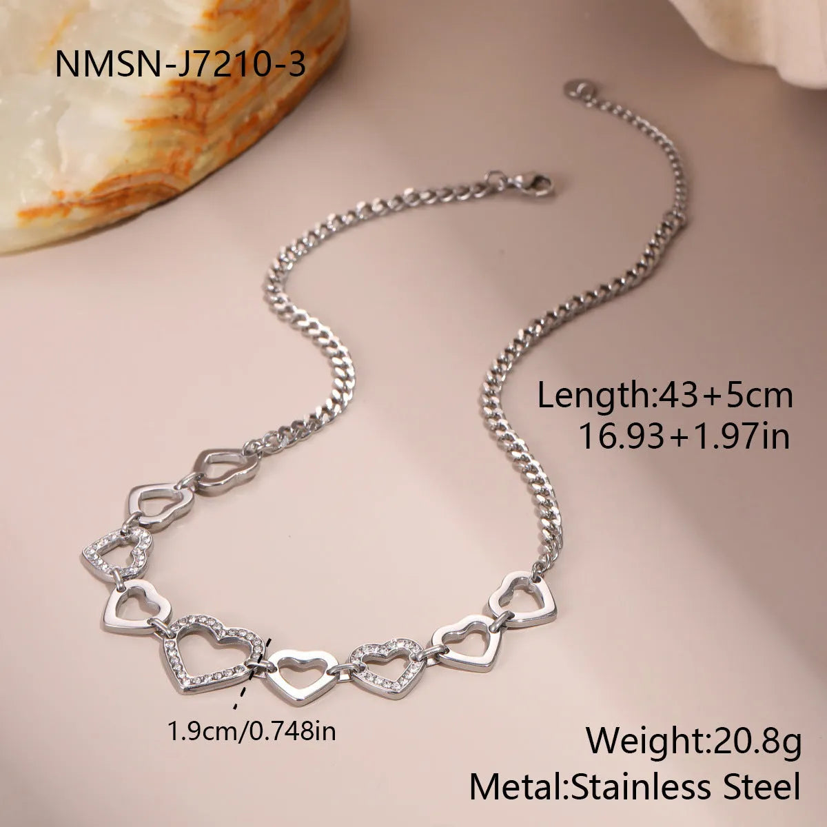 Geometric heart-shaped stainless steel necklace with 18K gold electroplated finish on clavicle chain
