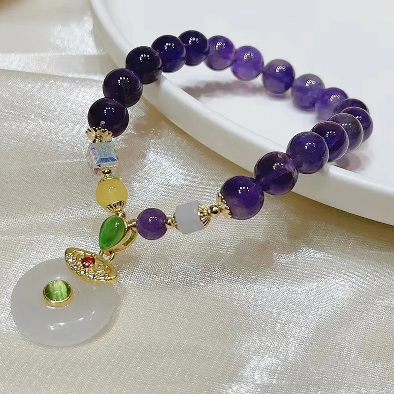Purple amethyst bracelet with money bag pendant and adjustable cord