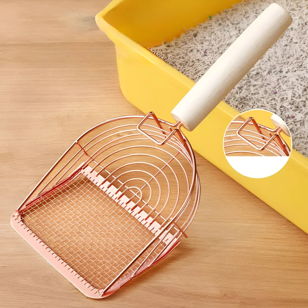 Stainless steel cat litter shovel with wooden handle showing screen filtration area and sharp edges