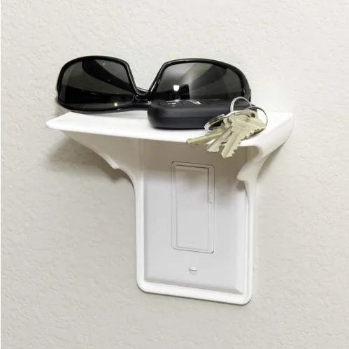 White polypropylene socket storage rack organiser with compartments, dimensions 14cm by 10cm by 15cm.