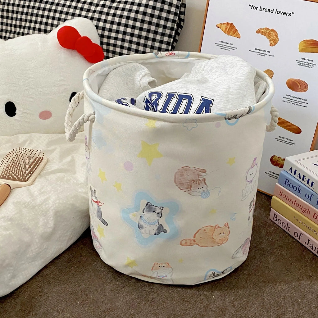 Foldable cotton cloth laundry basket in a choice of colours like puppy print or mint green.