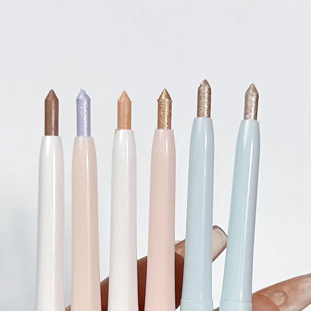 Waterproof brightening 2-in-1 eyeliner and eye shadow pen in multiple colour options on a white background.