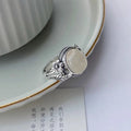 Adjustable vintage copper ring with imitation white chalcedony and U-shaped band design
